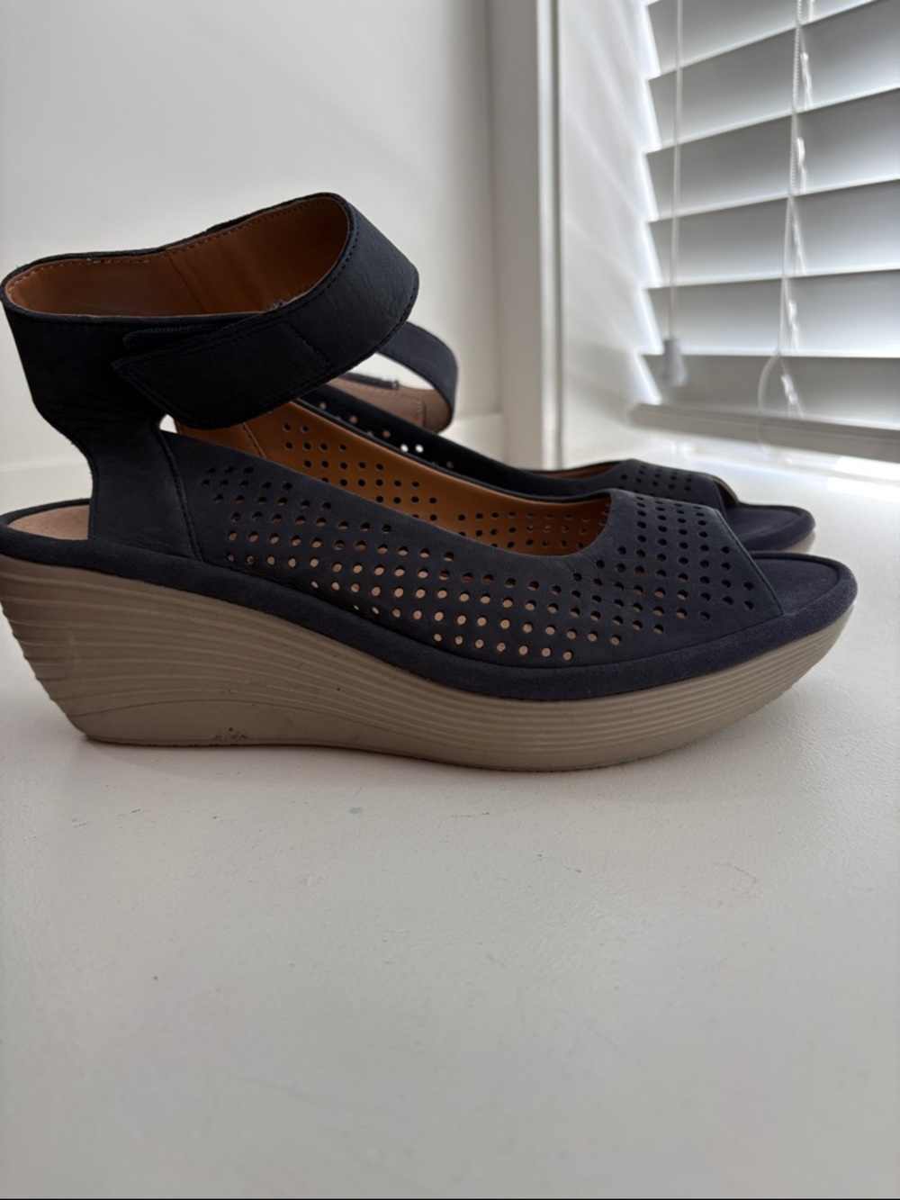 Clarks Black Perforated Wedge Sandals with Tan Platform